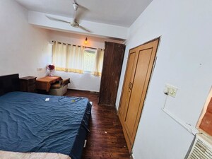 Bedroom in 2 BHK Apartment at Andheri CHS, Andheri West – for Rent