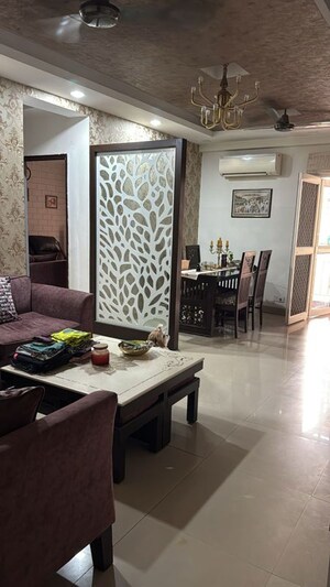 Living Room in 3 BHK Apartment at Aims Golf City, Sector 75 – for Rent
