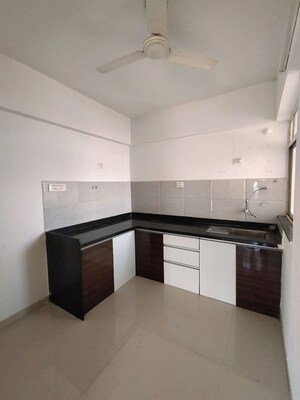 Kitchen in 2 BHK Apartment at Porwal Parklane Premier, Wagholi – for Sale