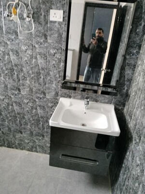 Bathroom in 4 BHK Apartment at Orris Aster Court Premier, Sector 85 – for Rent