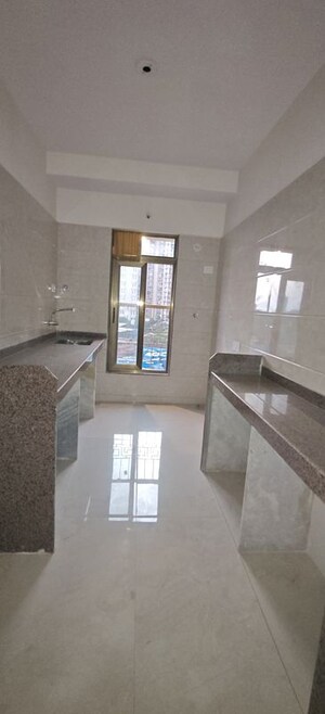 Kitchen in 2 BHK Apartment at Abrol Signature, Malad West – for Sale