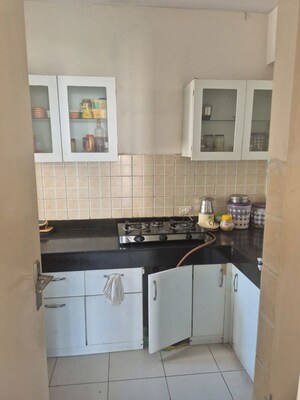 Kitchen in 2.5 BHK Apartment at Mahindra Aura, Sector 110a – for Sale