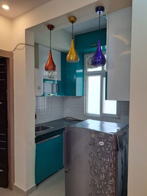 Kitchen in 1 BHK Apartment at Shree Vardhman Green Court, Sector 90 – for Rent