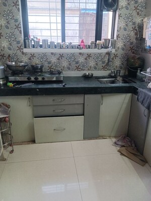 Kitchen in 2 BHK Apartment at Dharmavat Sunder Garden, Anand Nagar – for Rent