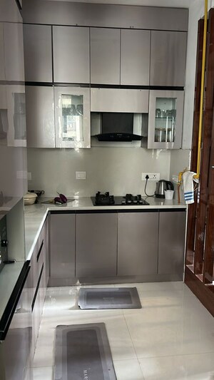 Kitchen in 3 BHK Apartment at Rani Aakriti Shantiniketan, Sector 143 – for Sale
