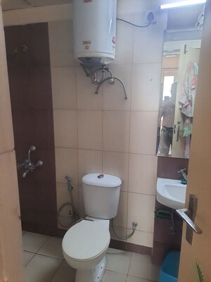 Bathroom in 3 BHK Apartment at Mahindra Aura, Sector 110a – for Sale