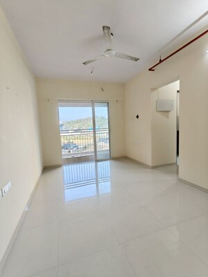 Living Room in 1 BHK Apartment at JP North Barcelona, Mira Road – for Rent