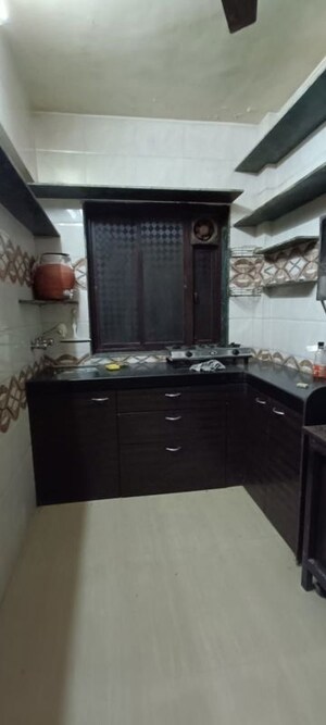 Kitchen in 1 RK Apartment at Alpa Park CHS, Ghatkopar West – for Rent