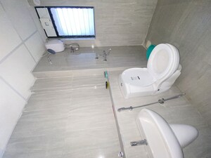 Bathroom in 1 BHK Apartment at Runwal Gardens, Dombivli East – for Rent
