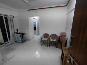 Living Room in 1 BHK Apartment at Raunak 108, Kasarvadavali – for Rent