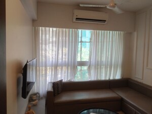 Living Room in 2 BHK Apartment at Swapnalok Apartments Malad East, Malad East – for Rent