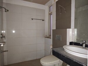 Bathroom in 4 BHK Apartment at Mahindra Aura, Sector 110a – for Sale