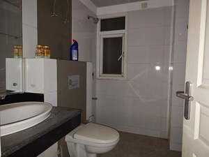 Bathroom in 4 BHK Apartment at Mahindra Aura, Sector 110a – for Sale