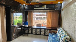 Living Room in 1 BHK Apartment at Agarwal Paramount, Virar West – for Rent