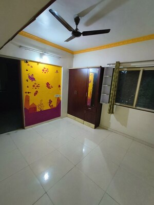 Bedroom in 2 BHK Apartment at Mangaltirth CHS, Ravet – for Rent