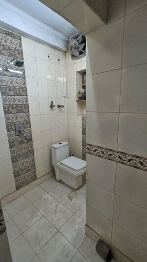 Bathroom in 4 BHK Builder Floor at Pitampura – for Rent