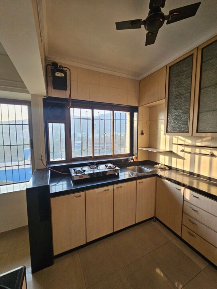 Kitchen, marathon-cosmos 2 Bedroom 620 Sq.Ft. Apartment In Mulund West Mumbai 10257538