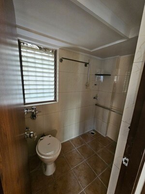 Bathroom in 2 BHK Apartment at Marathon Cosmos, Mulund West – for Rent