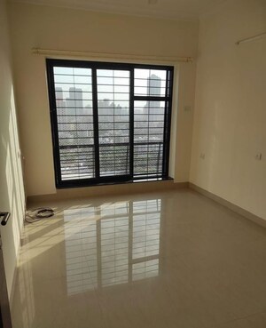 Room in 2 BHK Apartment at K Raheja Heights, Malad East – for Rent