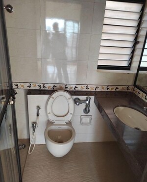 Bathroom in 2 BHK Apartment at K Raheja Heights, Malad East – for Rent