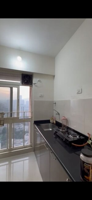 Kitchen in 1 BHK Apartment at Vijay Orovia, Ghodbunder Road – for Rent