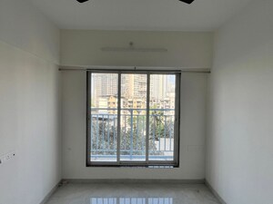 Room in 1 BHK Apartment at Shree Krushna Tower, Mulund West – for Rent