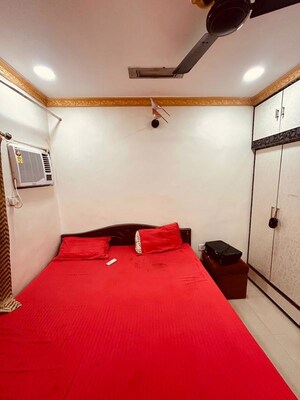 Bedroom in 2 BHK Apartment at Gokul Dham CHS, Goregaon East – for Sale