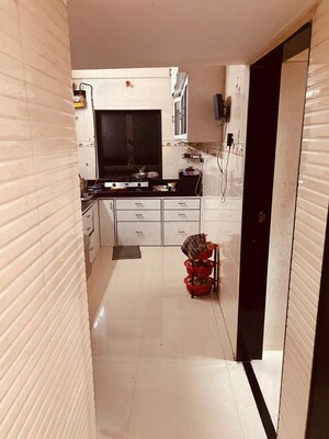 Kitchen in 2 BHK Apartment at Gokul Dham CHS, Goregaon East – for Sale
