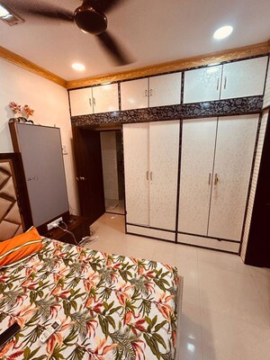 Bedroom in 2 BHK Apartment at Gokul Dham CHS, Goregaon East – for Sale