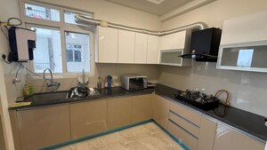 Kitchen in 3 BHK Apartment at Artique Uptown Skylla, International Airport Road – for Rent