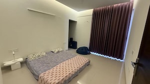 Bedroom in 3 BHK Apartment at Artique Uptown Skylla, International Airport Road – for Rent