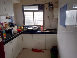 Kitchen in 1 BHK Apartment at Ashok Nagar Complex, Andheri East – for Rent