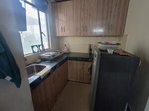 Kitchen in 2 BHK Apartment at Zara Aavaas, Sector 104 – for Rent