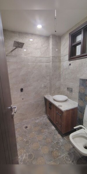 Bathroom in 3 BHK Builder Floor at Rohini Sector 16 – for Sale