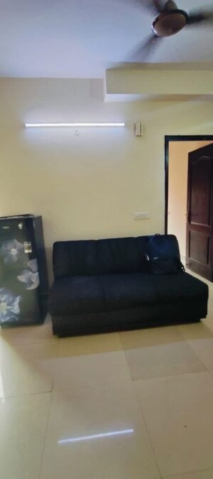Living Room in 3 BHK Apartment at Aims Golf City, Sector 75 – for Rent