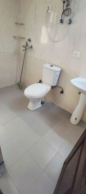 Bathroom in 3 BHK Apartment at Aims Golf City, Sector 75 – for Rent