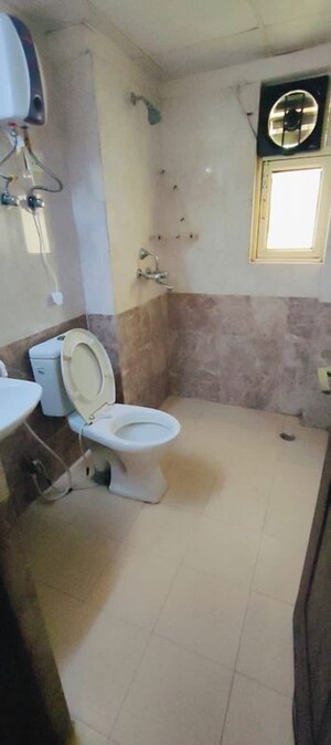 Bathroom in 3 BHK Apartment at Aims Golf City, Sector 75 – for Rent