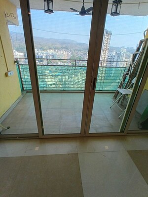 Balcony in 3 BHK Apartment at Lokhandwala Whispering Palms XXclusives, Kandivali East – for Rent