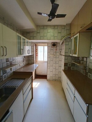 Kitchen in 3 BHK Apartment at Lokhandwala Whispering Palms XXclusives, Kandivali East – for Rent