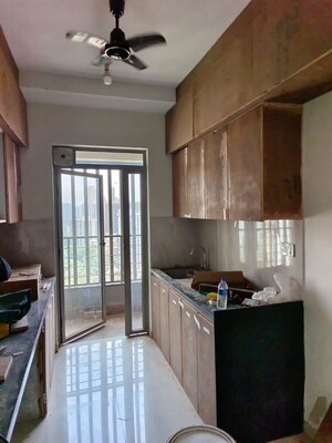 Kitchen in 2 BHK Apartment at Piramal  Vaikunth Cluster 4, Balkum Pada – for Rent