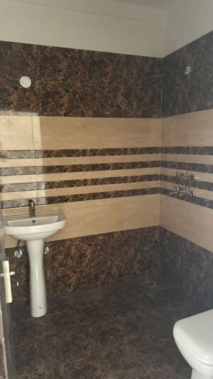 Bathroom in 1 BHK Apartment at Aura Homes, Patiala Road – for Rent