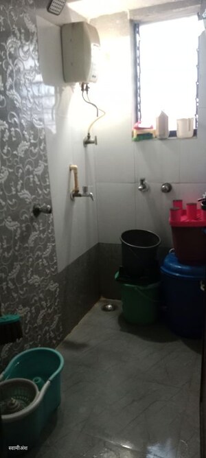Bathroom in 2 BHK Apartment at Balaji Palace CHS, Dombivli West – for Rent