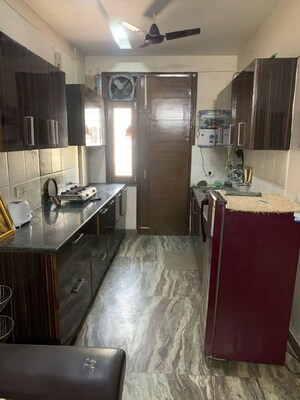 Kitchen in 3 BHK Builder Floor at Guru Nanak Enclave, Dhakoli – for Rent