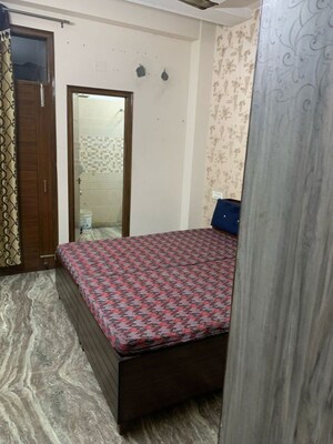 Bedroom in 3 BHK Builder Floor at Guru Nanak Enclave, Dhakoli – for Rent