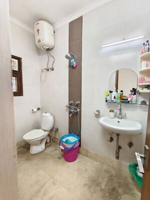 Bathroom in 3 BHK Apartment at Kalkaji – for Rent