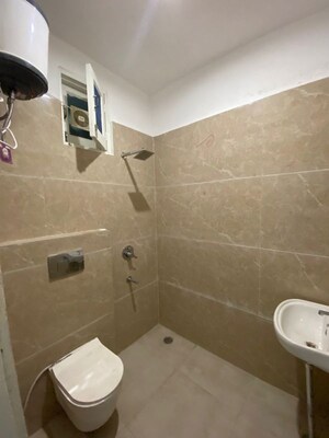 Bathroom in 3 BHK Builder Floor at Motia Blue Ridge, Dhakoli – for Rent