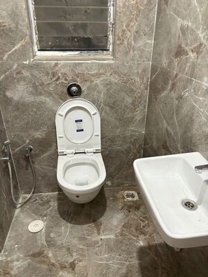 Bathroom in 1 BHK Apartment at Shraddha Panache, Tagore Nagar – for Rent