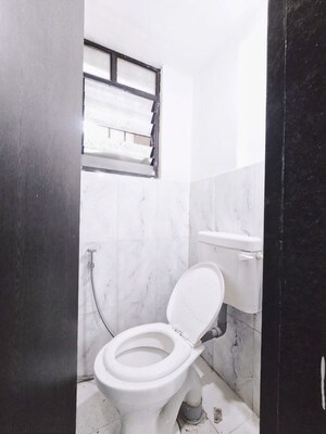 Bathroom in 1 BHK Builder Floor at Satyam Serenity, Wadgaon Sheri – for Rent