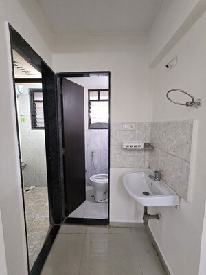 Bathroom in 1 BHK Builder Floor at Satyam Serenity, Wadgaon Sheri – for Rent