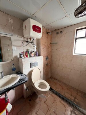 Bathroom in 3 BHK Apartment at Ruchi Active Greens, Tangra – for Rent